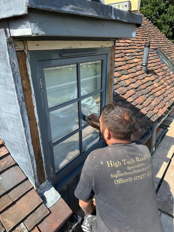 Professional Roofer at Work